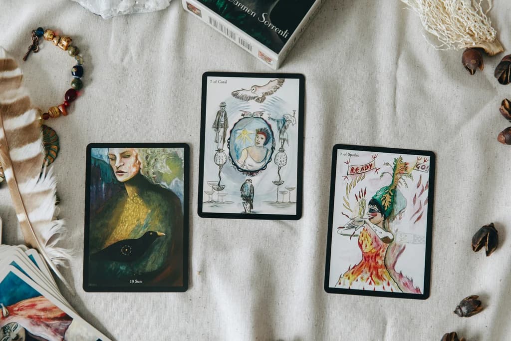 a group of tarot cards laid on a table