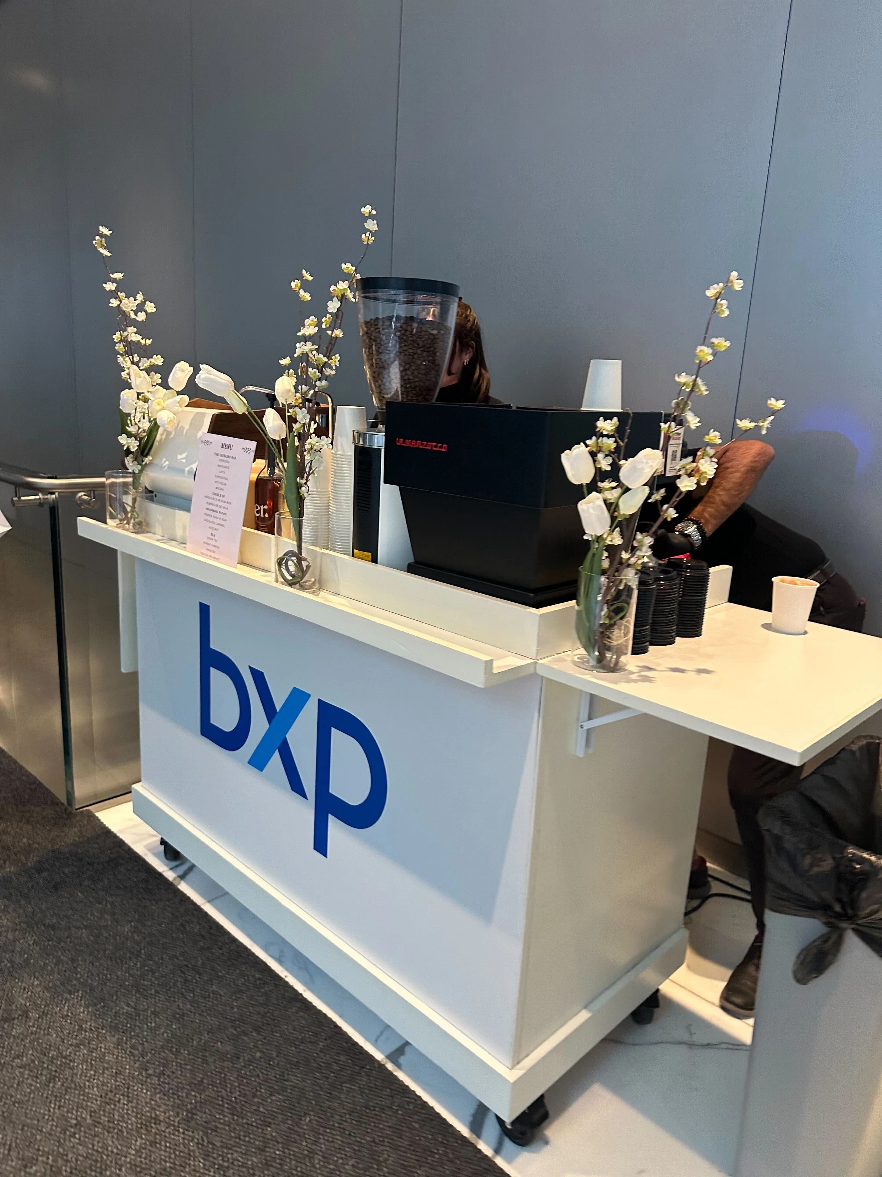 BXP Boston Properties branded coffee cart in corporate lobby