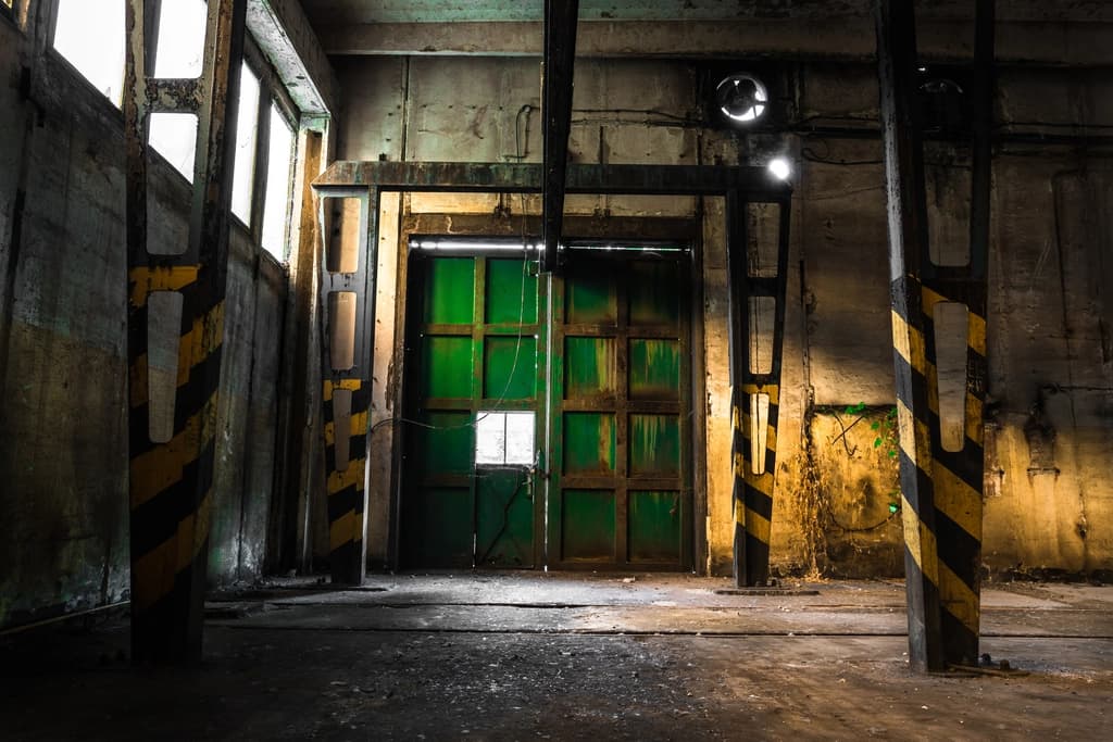 a warehouse room with a large door